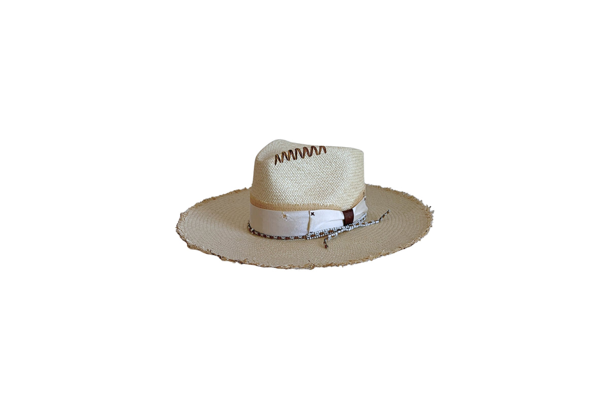 Salina natural Panama straw hat with saquapa bracelet, angled view