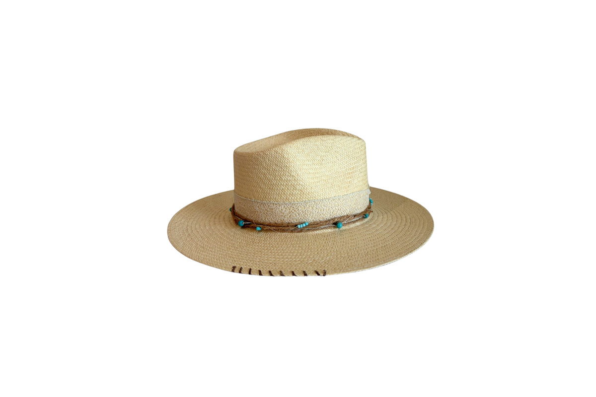 Turquesa natural Panama straw hat, side view with hand-stitched brim